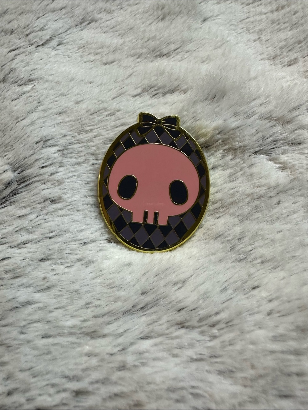 Pink Skull Enamel Pin with Black Argyle Frame
